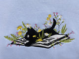 Cute cat read book embroidary